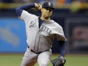 Seattle Mariners&#039; Taijuan Walker pitches to the Tampa Bay Rays during the first inning of a baseball game Tuesday (Chris O&#039;Meara/Associated Press)