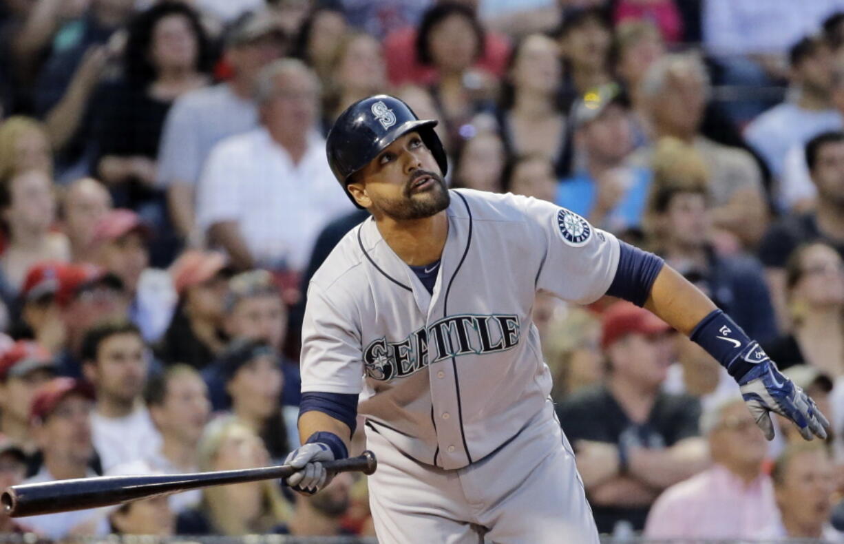 Seattle&#039;s Franklin Gutierrez watches his three-run double in the fourth inning against Boston Red Sox at Fenway Park.