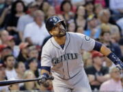 Seattle&#039;s Franklin Gutierrez watches his three-run double in the fourth inning against Boston Red Sox at Fenway Park.