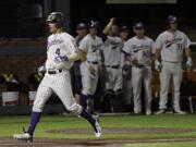 Washington's Jack Meggs (4) nears home plate after hitting a two-run home run in the eighth inning of an NCAA college baseball regional tournament game against Vanderbilt, Saturday, June 4, 2016, in Nashville, Tenn.