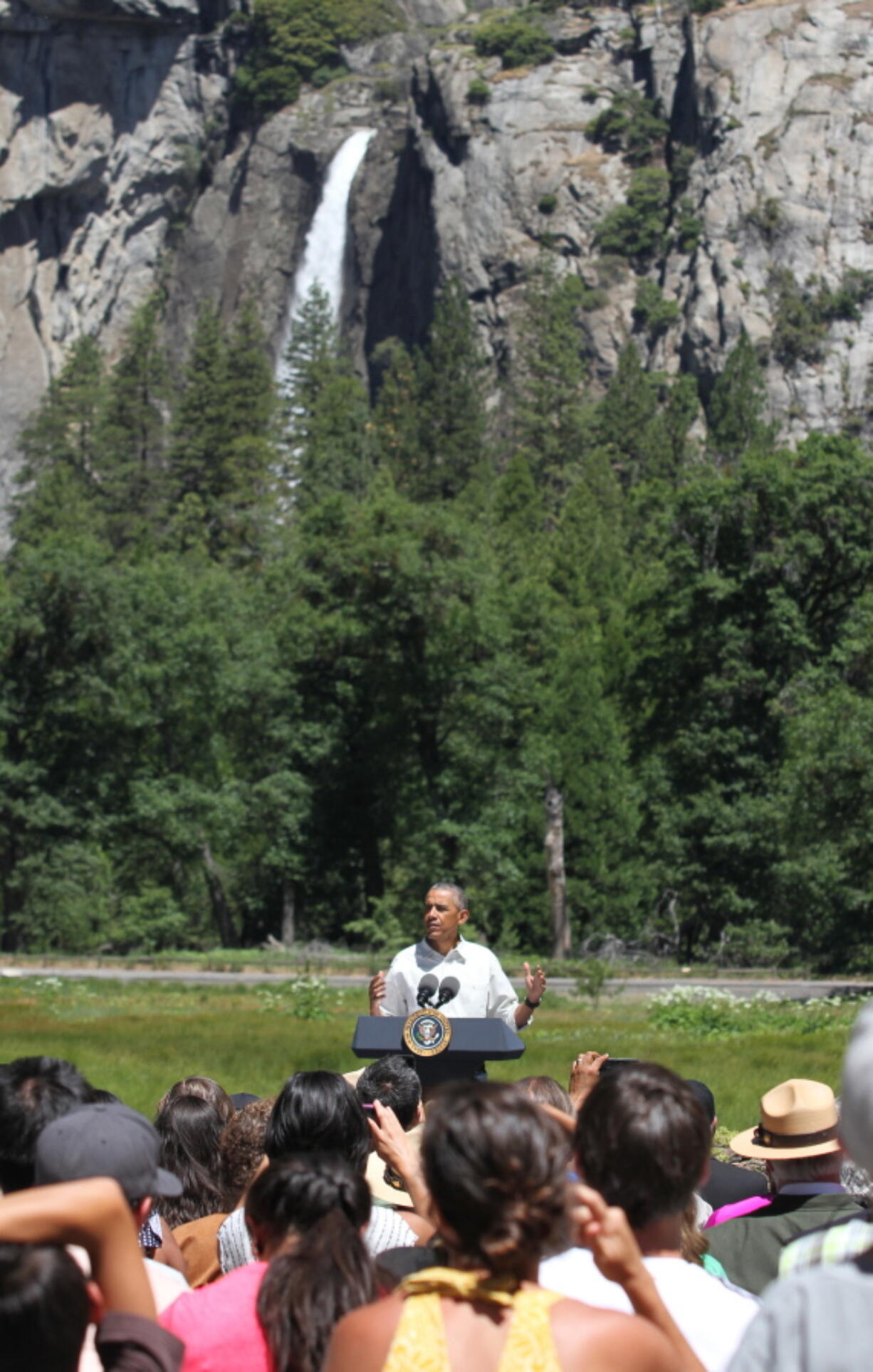 President Barack Obama speaks during a press conference in Cook&#039;s Meadow with Yosemite Falls in the background at Yosemite National Park, Calif., on Saturday, June 18, 2016.