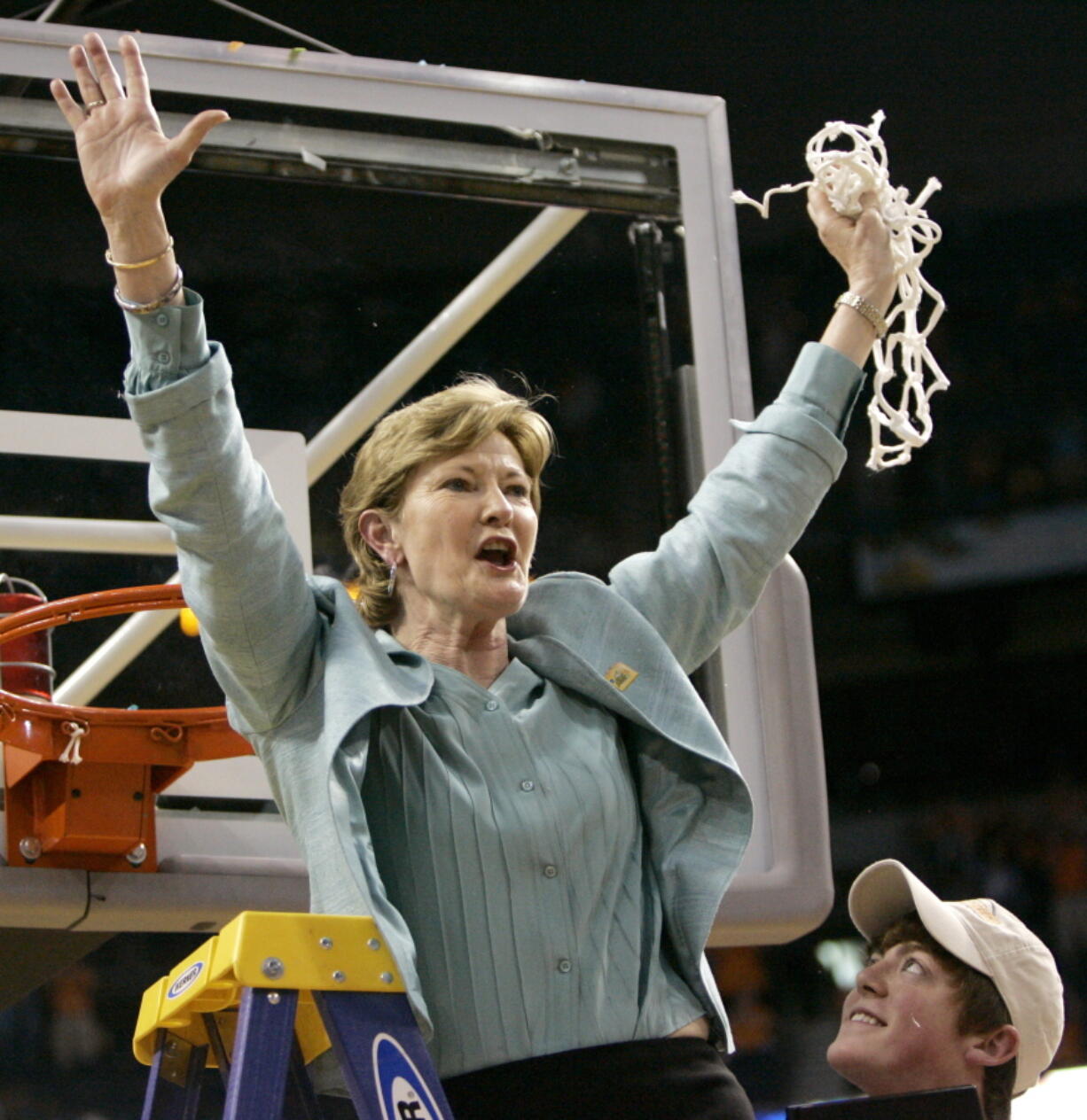 FILE - In this April 8, 2008, file photo, Tennessee coach Pat Summitt holds up the net as her son, Tyler, looks on after Tennessee beat Stanford 64-48 to win its eighth national women&#039;s basketball championship, at the NCAA women&#039;s basketball tournament Final Four in Tampa, Fla.  Summitt, the winningest coach in Division I college basketball history who uplifted the women&#039;s game from obscurity to national prominence during her career at Tennessee, died Tuesday morning, June 28, 2016. She was 64.