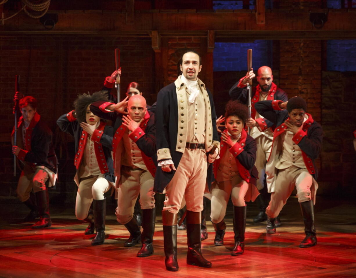 Lin-Manuel Miranda, foreground, performs with the cast of &quot;Hamilton&quot; in New York. The musical is a hip-hop tribute to American founding father Alexander Hamilton.