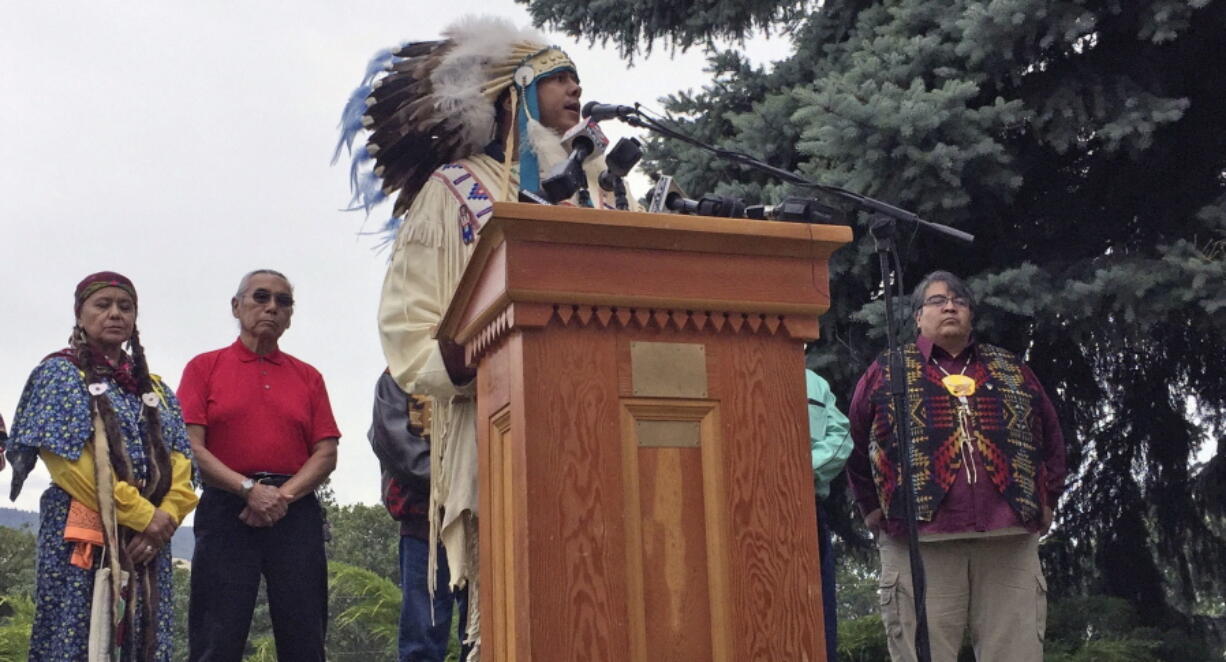 JoDe Goudy, chairman of the Yakama Nation, speaks to residents during a news conference held by Pacific Northwest tribes to condemn the transport of fossil fuels by rail through the Columbia River Gorge in this June 9, 2016, in Mosier, Ore. The fiery derailment of a Union Pacific oil train on June 3 led to evacuations and fear in this tiny river town and local tribes are also concerned about damage to the Columbia River.