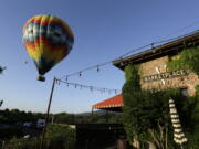 A hot air balloon lifts off at sunrise from Napa Valley Aloft in Yountville, Calif. Whether you&#039;re hurtling down a zip line or floating through the air in a hot air balloon, you have a few options when it comes to flying high in wine country.