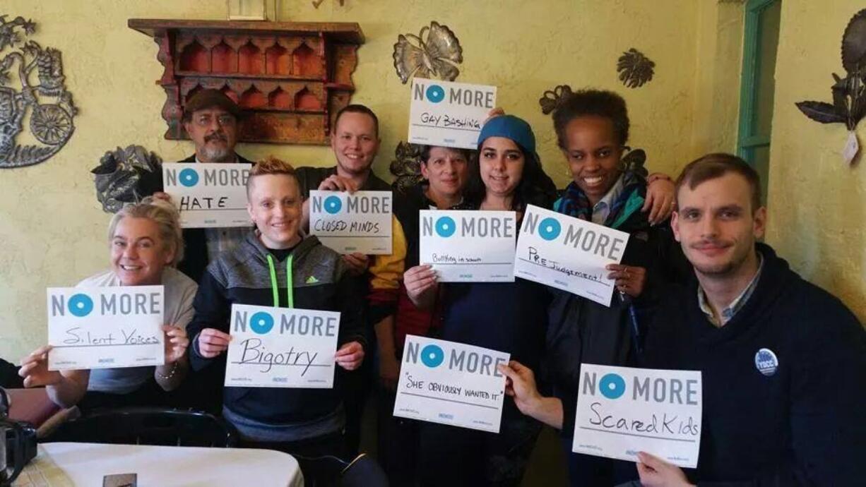 Erica Marchbank, second from bottom left, organizes monthly community-building breakfasts aimed at making Clark County's social fabric stronger.