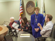 Salary Review Commission members Barry Hemphill, from left, Magan Reed, MarCine Miles and Thomas Hackett gather before the April 15 meeting at City Hall.