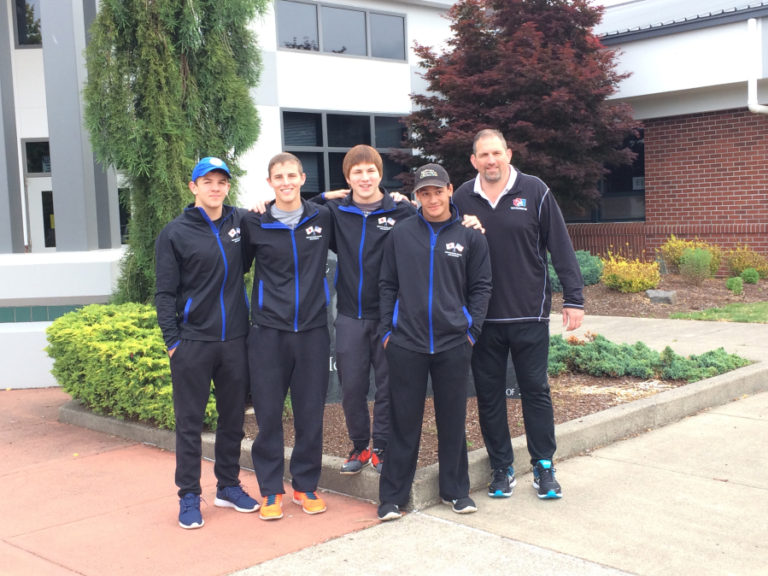 From left, James Rogers, Chris Joner, Adam Smalley, Kodi Walls and coach Jay Rogers recently spent 12 days in Japan on the Washington Wrestling Association Cultural Exchange Team.