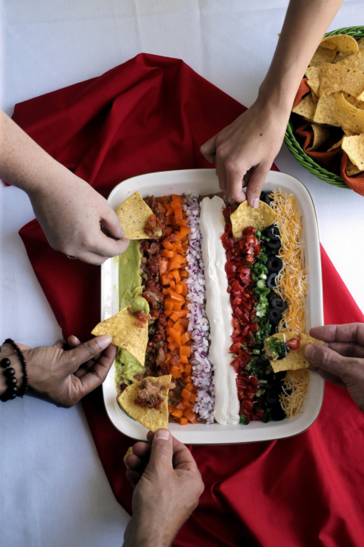 Garden in a Pan makes a great potluck food. (Cristina M. Fletes/St.