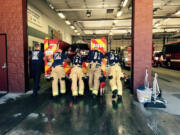 Firefighter-paramedics push their new medical response truck into the Hazel Dell Avenue fire station in 2015. Voters will decide in August whether to reauthorize the levy that helps pay for emergency medical services.