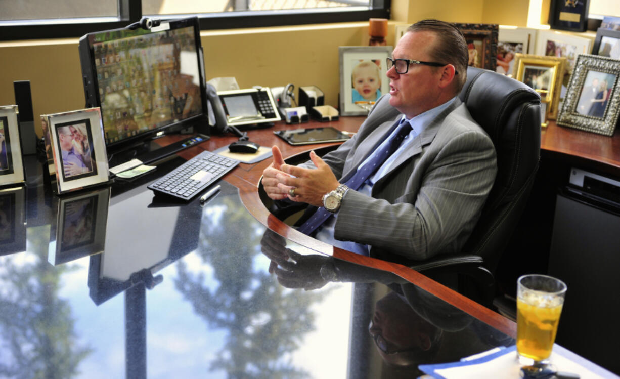 Brandon Dawson, founder and CEO of Audigy Group, speaks about his nomination as Entrepreneur of the Year for the Pacific Northwest in 2013 from his Vancouver office. Audigy, which provides business support for audiology practices, has been purchased for up to $151 million by Danish hearing aid company GN ReSound.