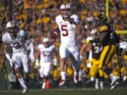 Stanford running back Christian McCaffrey scores against Iowa during the first half of the Rose Bowl game, Friday, Jan. 1, 2016, in Pasadena, Calif. (AP Photo/Mark J.