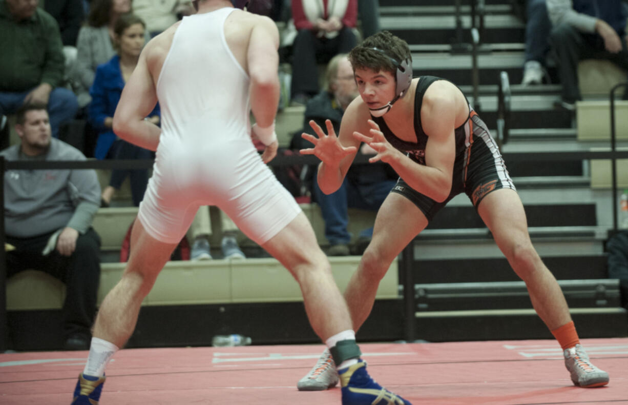 James Rogers of Battle Ground High School, right, won a national title in Greco-Roman wrestling at the USA Wrestling Cadet Nationals on Monday, July 18, 2016, at Fargo, N.D.