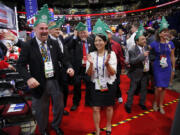 Washington delegates, along with state Sen. Don Benton, R-Vancouver, third from left, cheer Tuesday during the second day of the Republican National Convention in Cleveland.