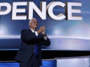 Republican vice presidential candidate Gov. Mike Pence, R-Ind., arrives on stage to deliver his acceptance speech Wednesday at the Republican National Convention in Cleveland.