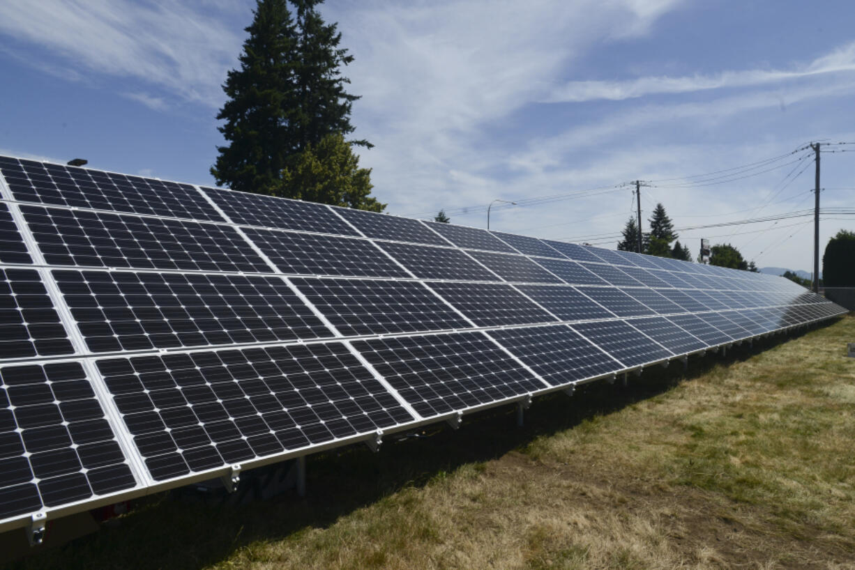 Clark Public Utilities hosts a community solar panel system, a 74.8-kilowatt solar array, outside its Orchards operations center. A new report says Washington state has the capability to produce 21 times more electricity than it uses, though several factors are keeping the state from growing capacity.