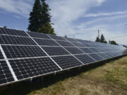 Clark Public Utilities hosts a community solar panel system, a 74.8-kilowatt solar array, outside its Orchards operations center. A new report says Washington state has the capability to produce 21 times more electricity than it uses, though several factors are keeping the state from growing capacity.