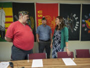 Veterans Jerry Vincent, from left, and Kevin Russell chat with U.S. Rep. Jaime Herrera Beutler, R-Camas, before the start of the meeting Tuesday morning to address veterans&#039; health care at the Clark County Veterans Assistance Center.