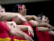 Leinq&#039;ala Slaughter, of Portland, practices with her dance group Hula Halau He Makana O Aloha before taking the stage during the Ho&#039;ike and Hawaiian Festival at Esther Short Park in 2010.