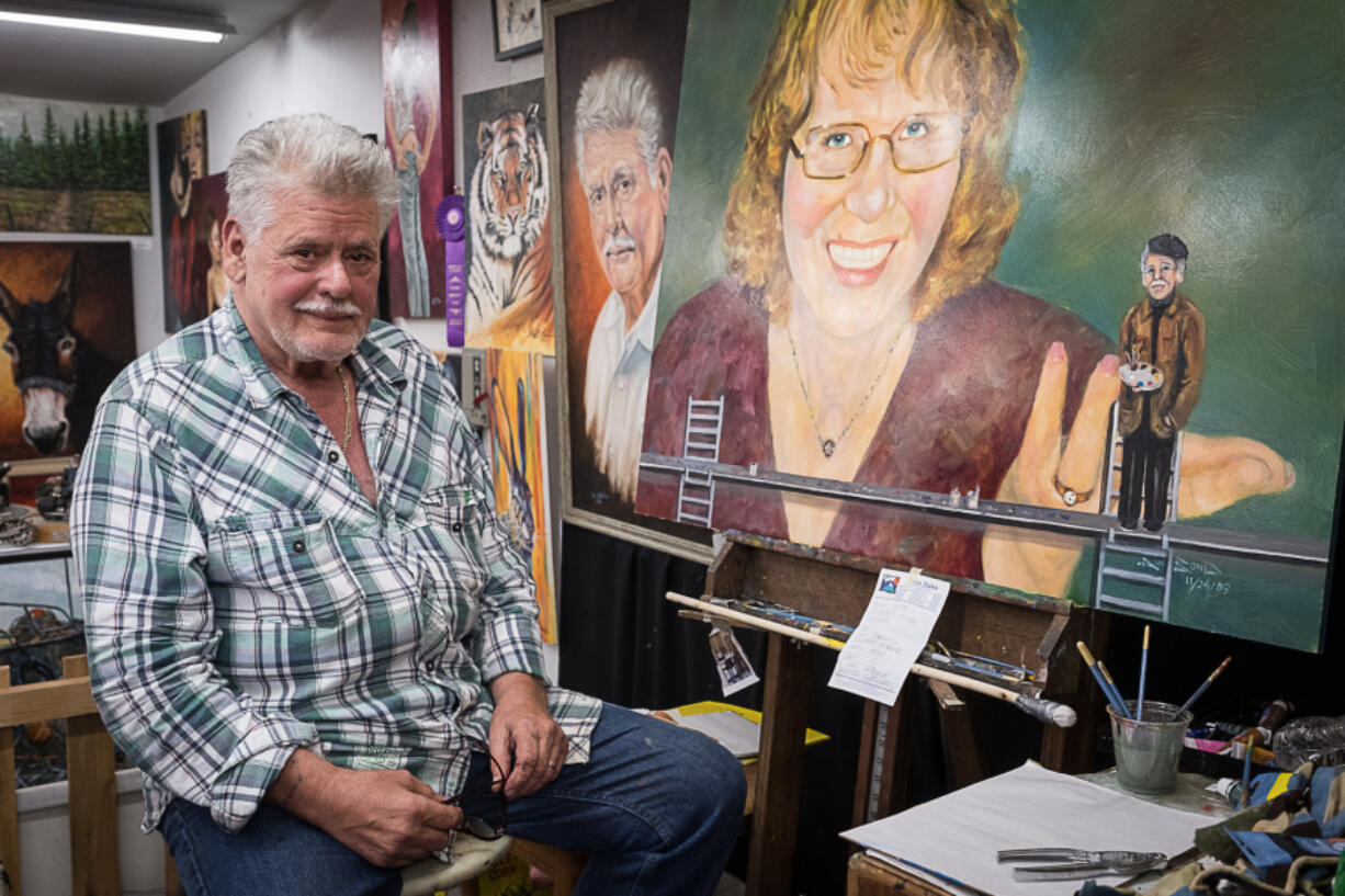 Painter, teacher and gallery owner Blue Bond at his Hazel Dell Studio. That&#039;s a miniature Bond himself at right, clearly at the mercy of wife Karen.