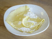 A crepe with French butter, lemon juice and powdered sugar is served July 21 at C&#039;est La Vie in Hazel Dell.