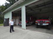 Clark County Fire &amp; Rescue Division Chief of Operations Mike Jackson stands outside Fire District 2&#039;s fire station, which is used for storage since nobody operates out of it at the moment. It was previously used by volunteers who came from the former Woodland Fire Department. District 2 residents will vote on a potential merger with Clark County Fire &amp; Rescue on Aug. 2.