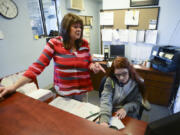 Darlene Scherer-O&#039;Mara, left, a dispatcher at Chappelle&#039;s Towing LLC in Vancouver, trains Chelsea Bonawitz on Wednesday.