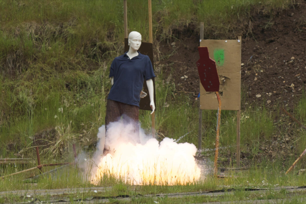 A mannequin is used to show the damage fireworks can cause during a demonstration hosted by the Vancouver Fire Department, ATF and the fireworks industry at Camp Bonneville, Monday, June 16, 2014.