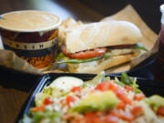 A mozzarella, tomato, basil (MBT) sandwich, lobster bisque soup and power quinoa salad are on the menu at Zoup! in Vancouver.