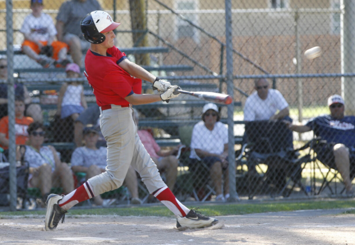 Jasper Rank connects on a hit for the Hazel Dell Metro Babe Ruth team against Idaho on Thursday at Louis Bloch Park. Rank went 4 for 4 with two doubles, two RBI and scored twice as Hazel Dell Metro won the game 8-2.