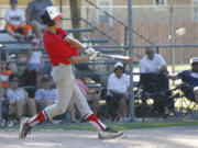 Jasper Rank connects on a hit for the Hazel Dell Metro Babe Ruth team against Idaho on Thursday at Louis Bloch Park. Rank went 4 for 4 with two doubles, two RBI and scored twice as Hazel Dell Metro won the game 8-2.