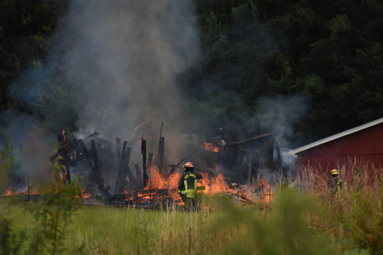 Fire destroyed a barn north of Dollars Corner on Tuesday morning, according to Clark County Fire &amp; Rescue.