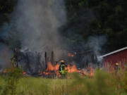 Fire destroyed a barn north of Dollars Corner on Tuesday morning, according to Clark County Fire &amp; Rescue.