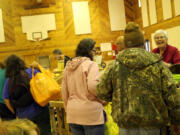 Hazel Dell North: Customers file through the offerings at St.