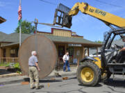 Washougal: Delivery of the 9-foot tall, 700-pound saw blade from the Camas paper mill&#039;s wood mill to the Two Rivers Heritage Museum, where it will be on display.