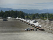 Wind turbines sit on the loop track at the Port of Vancouver&#039;s Terminal 5. Thanks to renewed federal tax incentives, imported wind turbine parts are again making stops at the port en route to wind farms around the country.