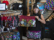 Stephanie Lynn shows one of her reversible skirts. Designed for active women, snaps allow the fit to be adjusted.