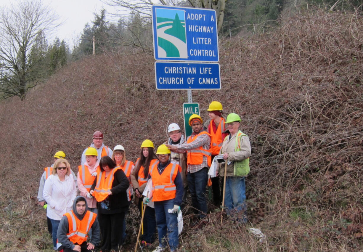 A group of volunteers from Christian Life Church participate in the Washington State Department of Transportation&#039;s Adopt-a-Highway program every three months by cleaning up a segment of state Highway 14.