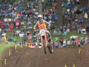 Marvin Musquin of France is seen descending a hill in the 450cc race in the Washougal MX National in Washougal Saturday July 23, 2016.