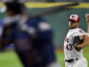 Houston Astros starting pitcher Lance McCullers (43) delivers in the first inning of a baseball game against the Seattle Mariners, Monday, July 4, 2016, in Houston.