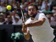 Marin Cilic of Croatia, pictured, and Ivan Dodig defeated Bob and Mike Bryan in the doubles match of the Davis Cup quarterfinals at Beaverton, Ore., on Saturday, July 16, 2017, to cut the U.S. lead in the best-of-five to 2-1.