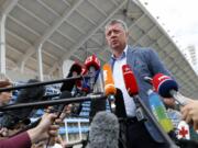 Dmitry Shlyakhtin, head of the Russian track and field federation, speaks to journalists prior to the Russian Athletics Cup, at Zhukovsky, outside Moscow, Russia, Thursday, July 21, 2016. Russia lost its appeal Thursday against the Olympic ban on its track and field athletes, a decision which could add pressure on the IOC to exclude the country entirely from next month's games in Rio de Janeiro.