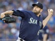 Seattle Mariners starting pitcher James Paxton throws against the Toronto Blue Jays during the first inning of a baseball game in Toronto, Friday, July 22, 2016.