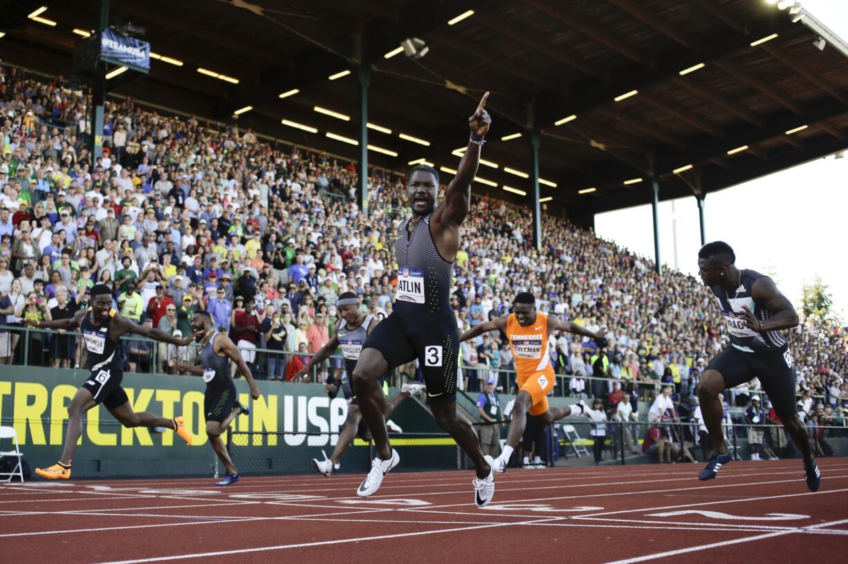 Justin Gatlin reacts after winning the during for men's 100-meter final at the U.S. Olympic Track and Field Trials, Sunday, July 3, 2016, in Eugene Ore.