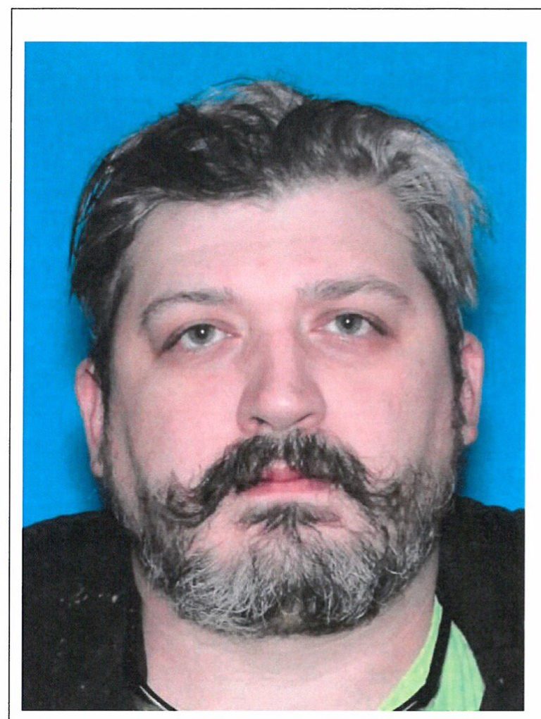 A more recent photo of triple-homicide suspect Brent W. Luyster. Officials said he was clean-shaven with close-cropped hair when the shooting occurred Friday.