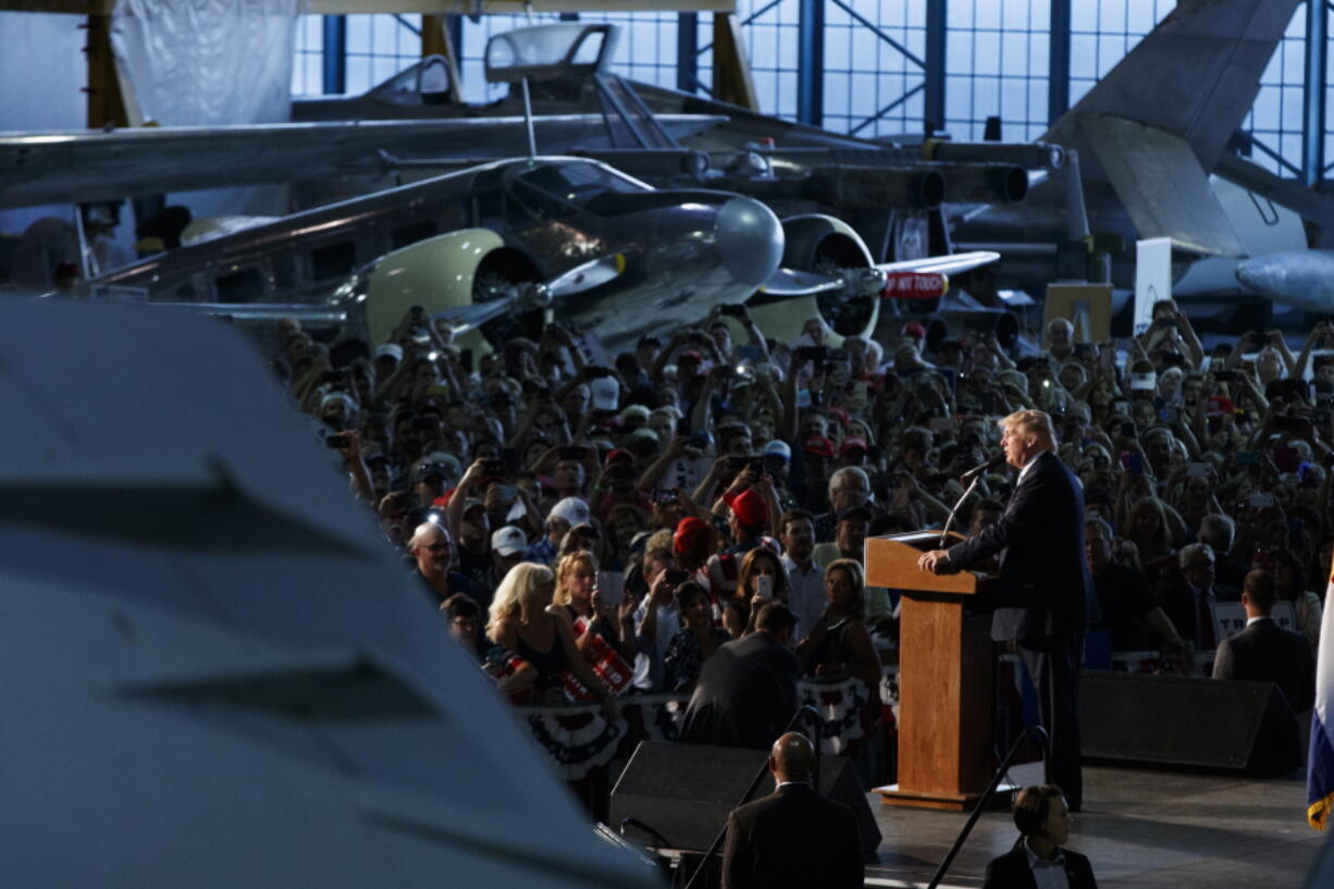 Republican presidential candidate Donald Trump speaks during a campaign rally at Wings Over the Rockies Air and Space Museum, Friday, in Denver.