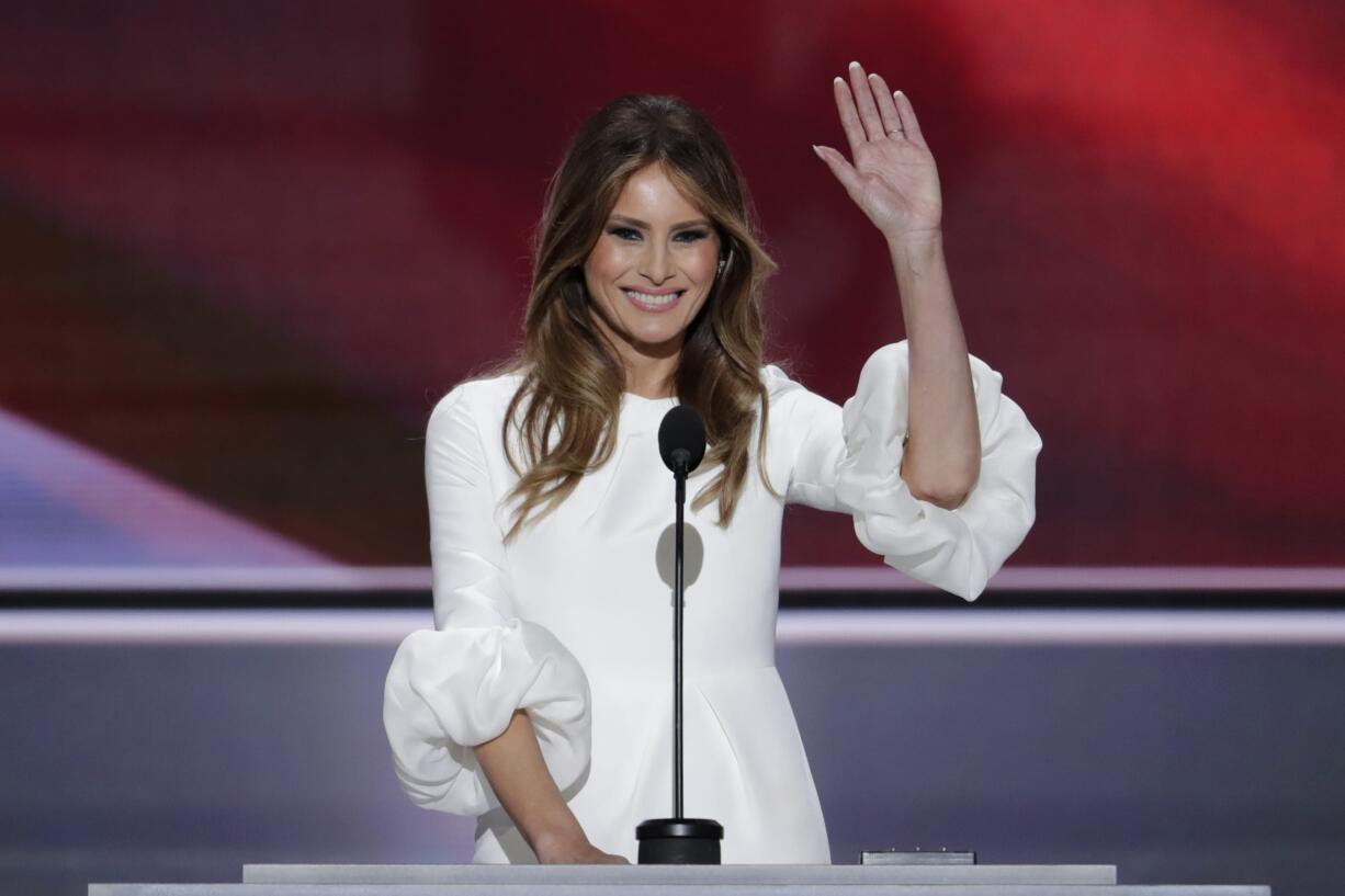 Melania Trump, wife of Republican Presidential Candidate Donald Trump waves as she speaks during the opening day of the Republican National Convention in Cleveland, Monday, July 18, 2016. (AP Photo/J.