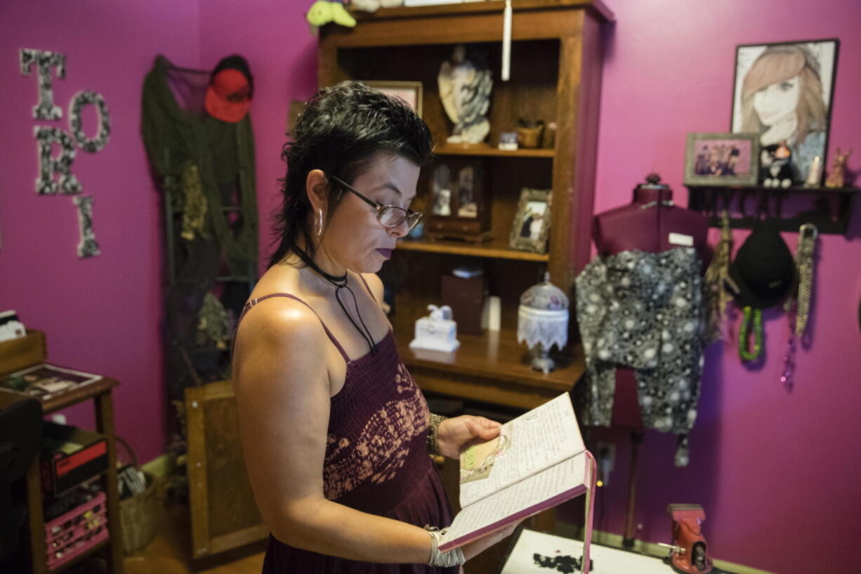 Stephanie Moyer reads her daughter&#039;s diary in Lebanon, Pa., on Friday. Moyer&#039;s daughter Victoria &quot;Tori&quot; Herr died Easter Sunday 2015 following heroin withdrawal days into her first jail stint.