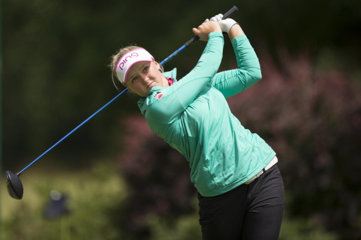 Brooke Henderson, of Canada, hits a tee shot on the third hole during the final round of the LPGA Cambia Portland Classic golf tournament Sunday, July 3, 2016, in Portland, Ore.