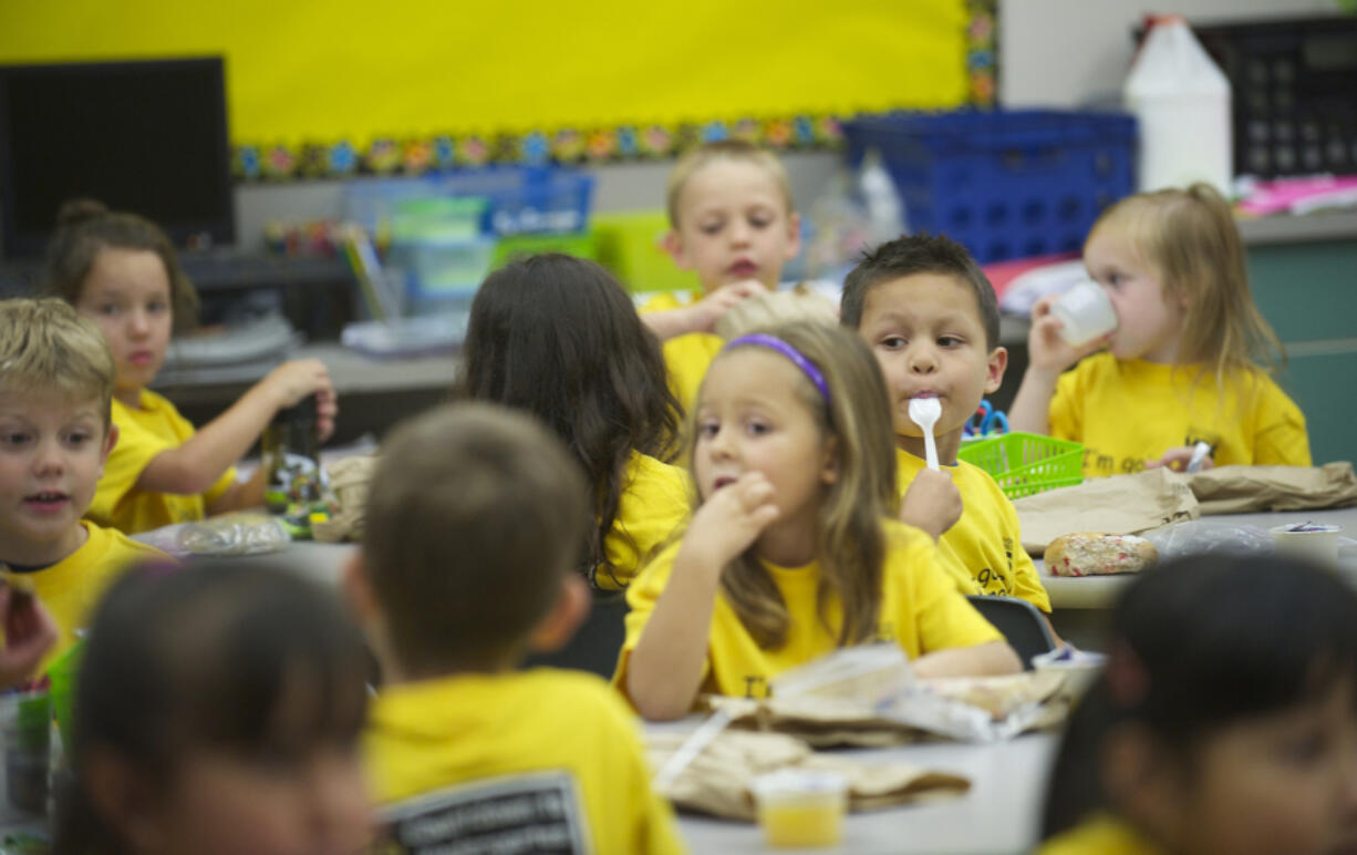 Harney Elementary School kindergarten teacher Renee Sutter&#039;s class enjoys snack time at Kindergarten Jump Start in 2013.